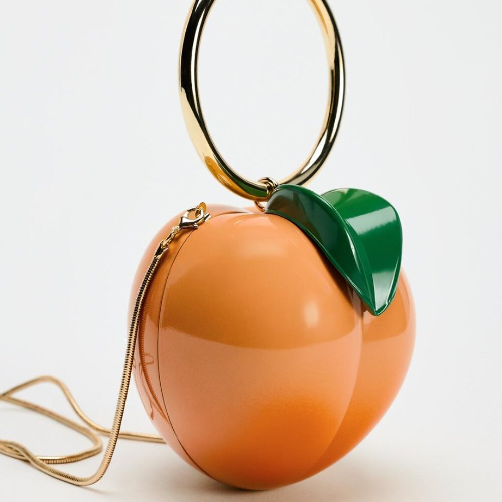 Zara Orange Peach-Shaped Wristlet with Green Leaf Accent